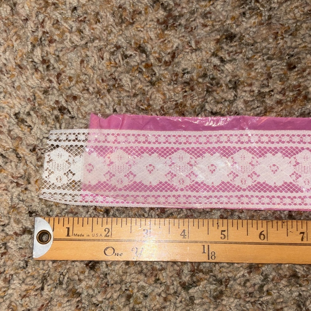 White lace trim approximately 270 inches long